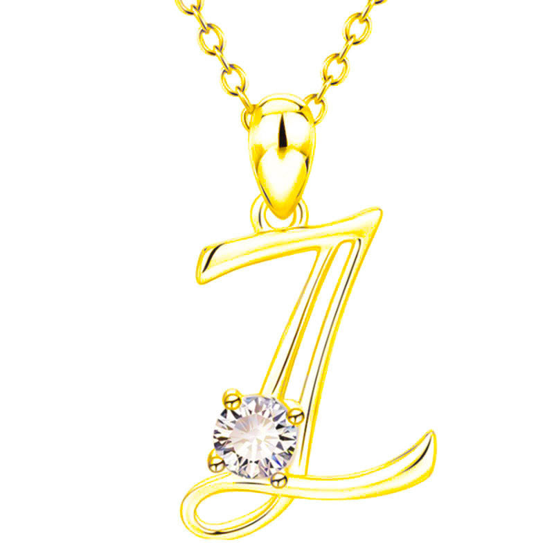 Collier avec initiale en or et strass tendance