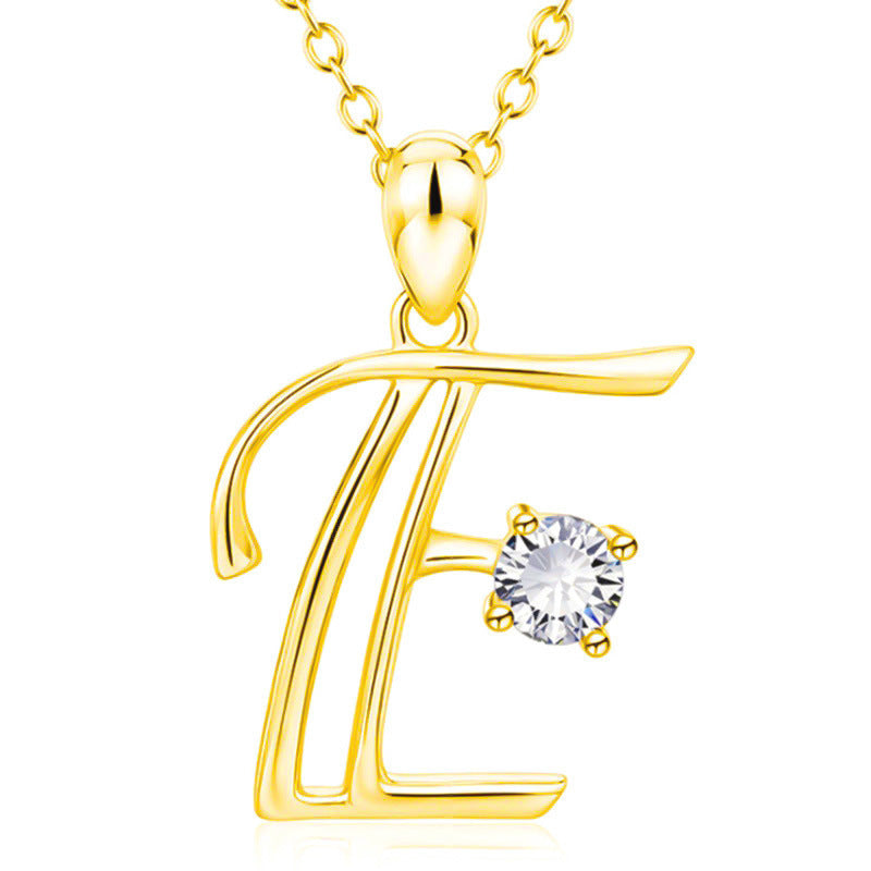 Collier avec initiale en or et strass tendance