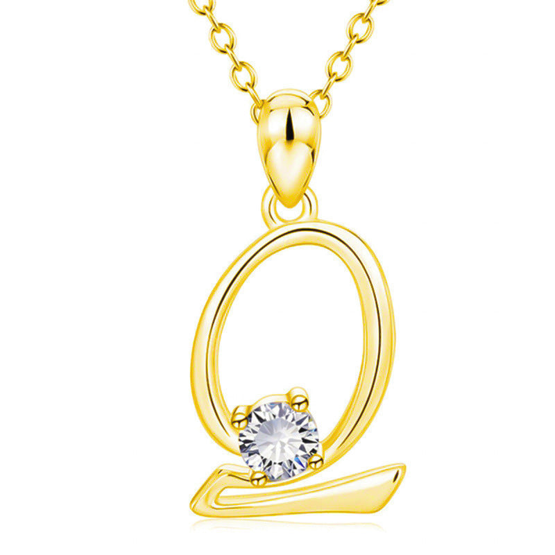 Collier avec initiale en or et strass tendance