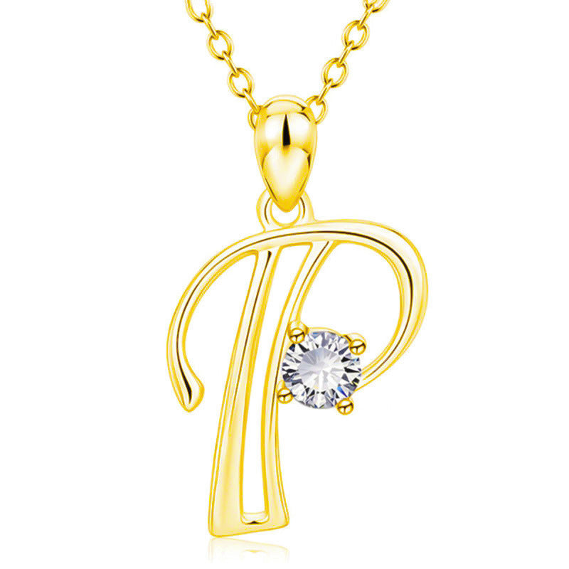 Collier avec initiale en or et strass tendance