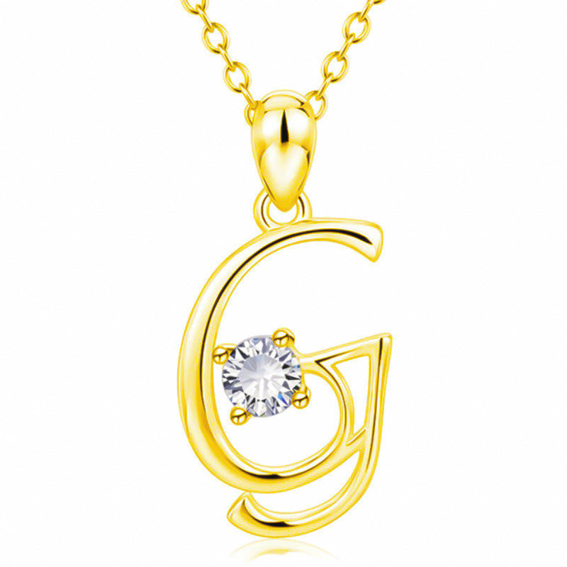 Collier avec initiale en or et strass tendance
