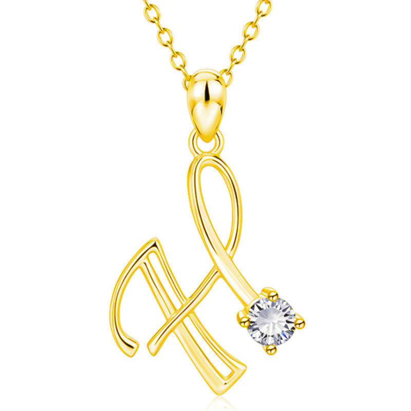 Collier avec initiale en or et strass tendance