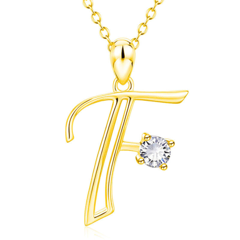 Collier avec initiale en or et strass tendance