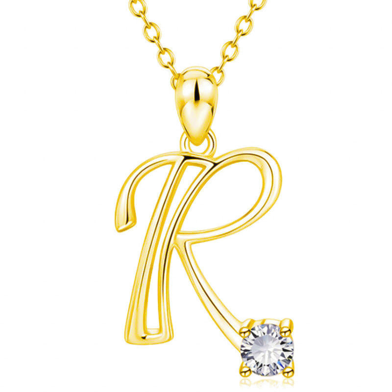 Collier avec initiale en or et strass tendance