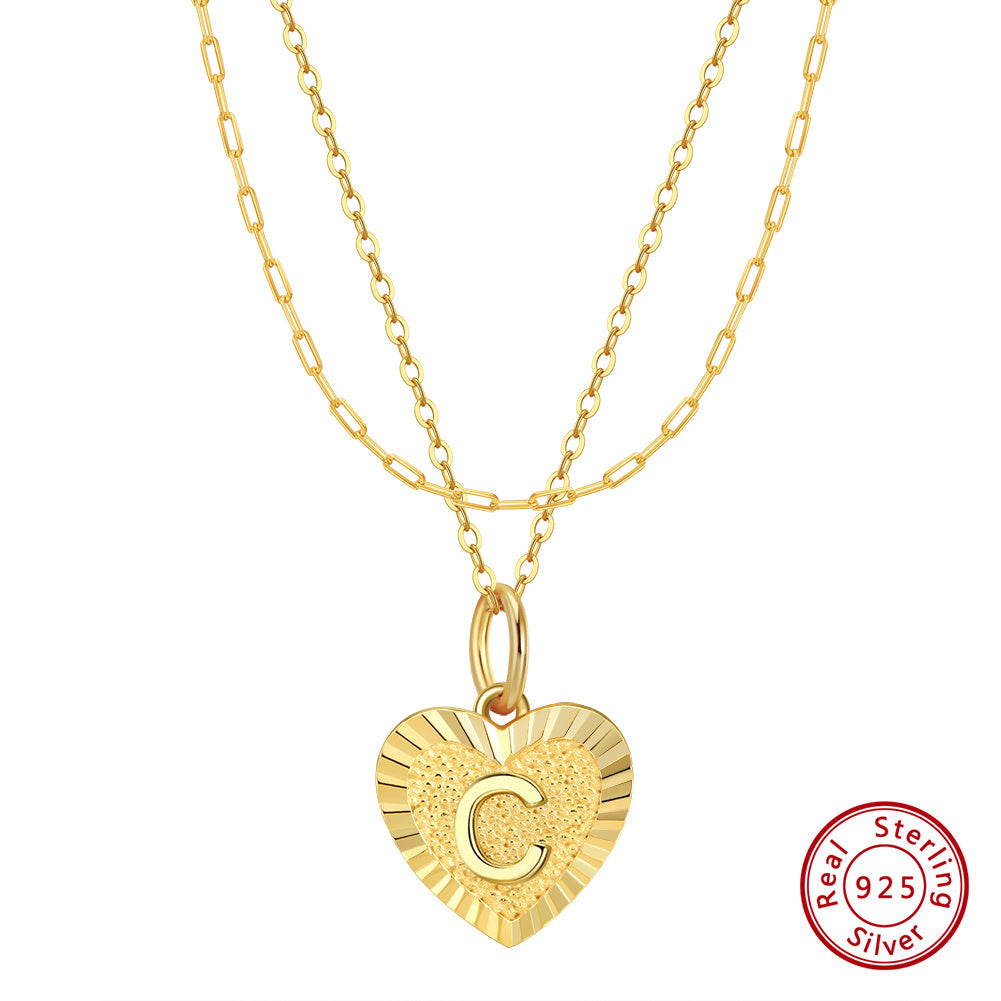 Collier cœur superposé avec initiale en argent