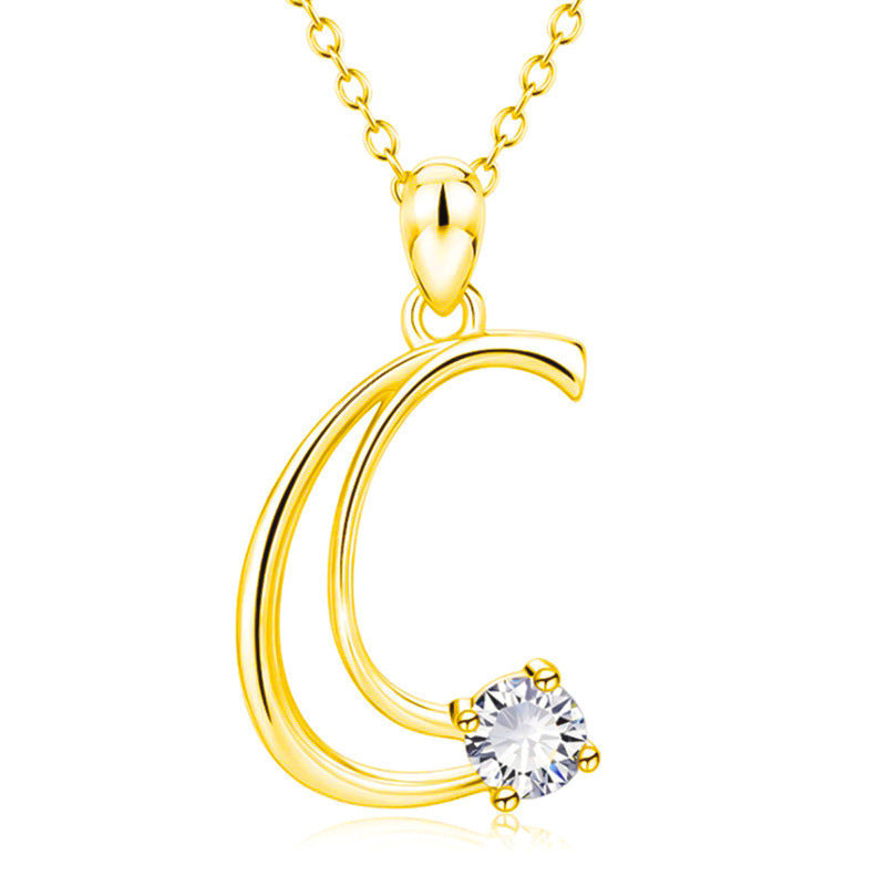 Collier avec initiale en or et strass tendance