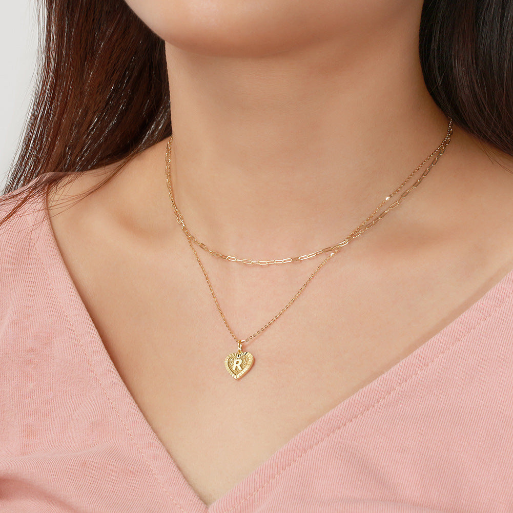 Collier cœur superposé avec initiale en argent