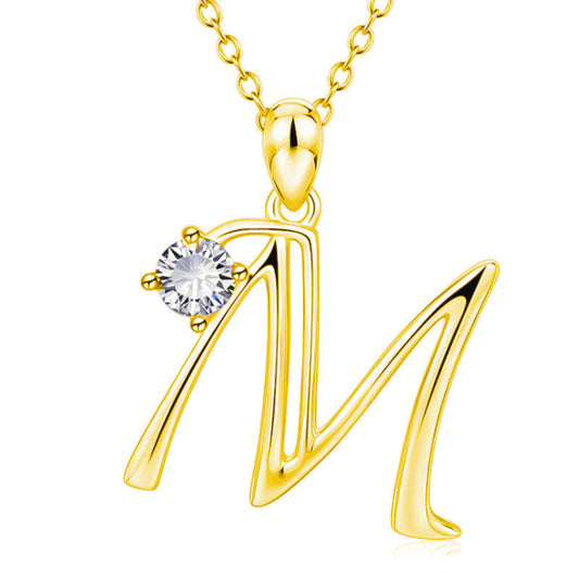 Collier avec initiale en or et strass tendance