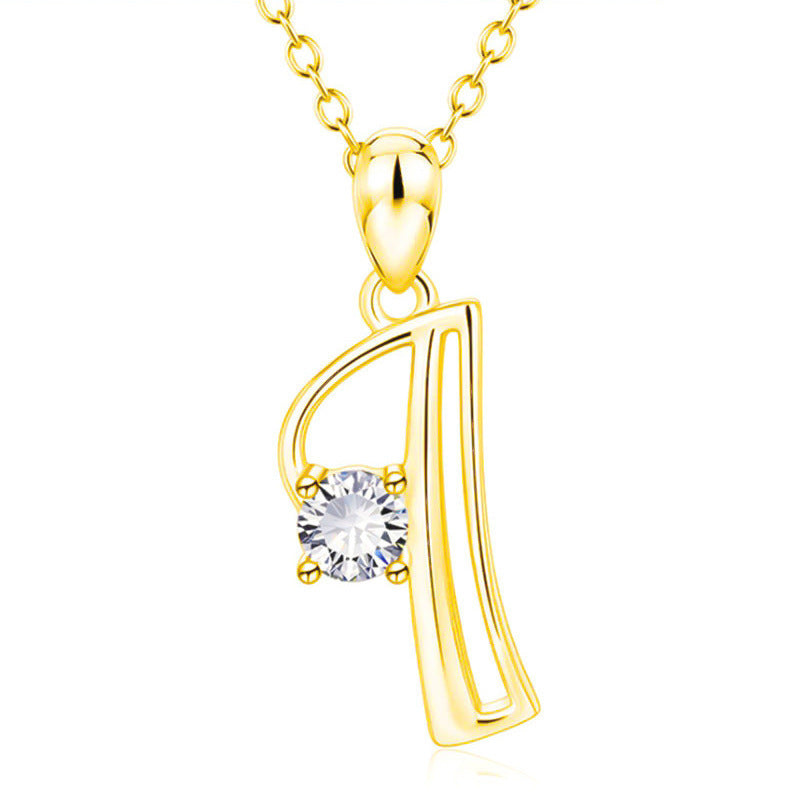 Collier avec initiale en or et strass tendance